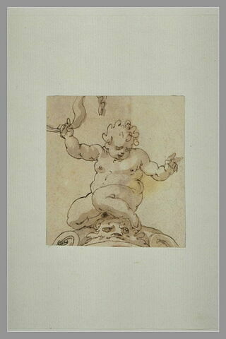 Enfant nu, assis, tenant un serpent dans la main droite, image 2/2