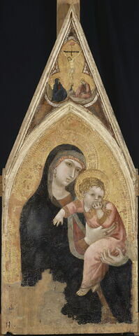 La Vierge et l'Enfant ; dans le médaillon trilobé à l'intérieur du gâble, Le Calvaire