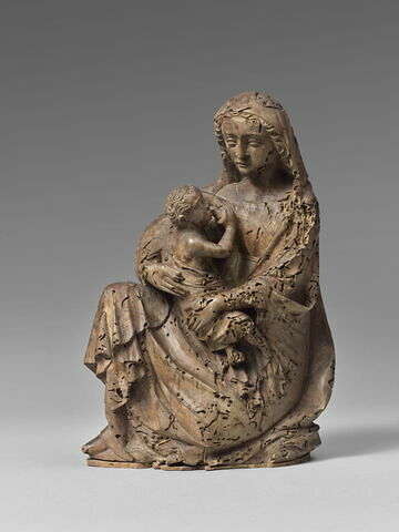La Vierge assise sur le sol et allaitant l'Enfant