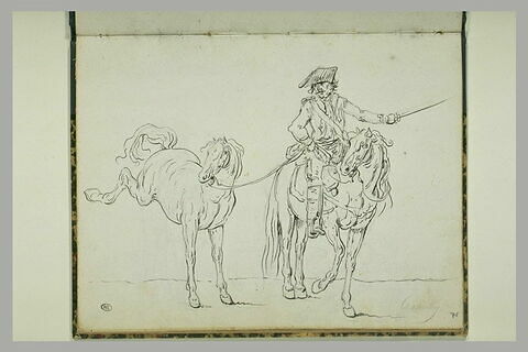 Cavalier tenant un cheval non sellé par la bride, image 1/1