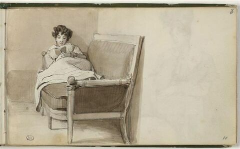 Femme lisant sur un sofa, image 1/2