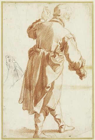 Homme debout de dos, se dirigeant vers la droite ; reprise de la main gauche, image 1/2