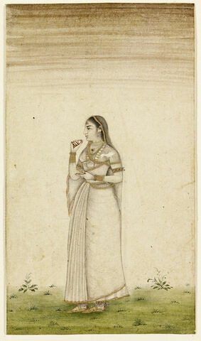 Jeune femme indienne machant du bétel, image 1/1