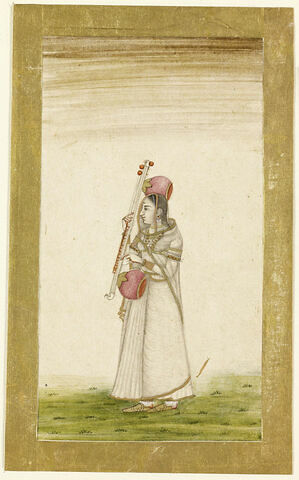 Jeune femme indienne jouant de la vina, image 1/1