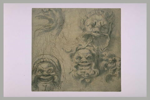 Trois mascarons vus de face, une tête d'aigle et une tête de lion ornementales vues de profil ; un homme nu vu de dos, image 2/2