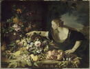Femme prenant un fruit dans une coupe de fleurs et de fruits, image 4/4