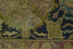Fragment de tapis à décor d'arabesques et fleurs de lotus dit 