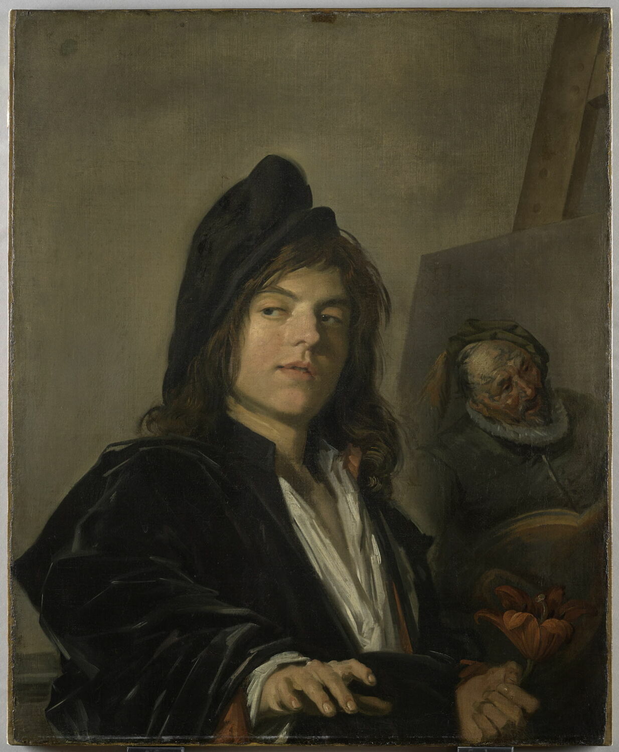 Jeune homme tenant une fleur, dit autrefois Le Peintre ambulant, Hals, Frans, 2e quart du XVIIe siècle (1640)