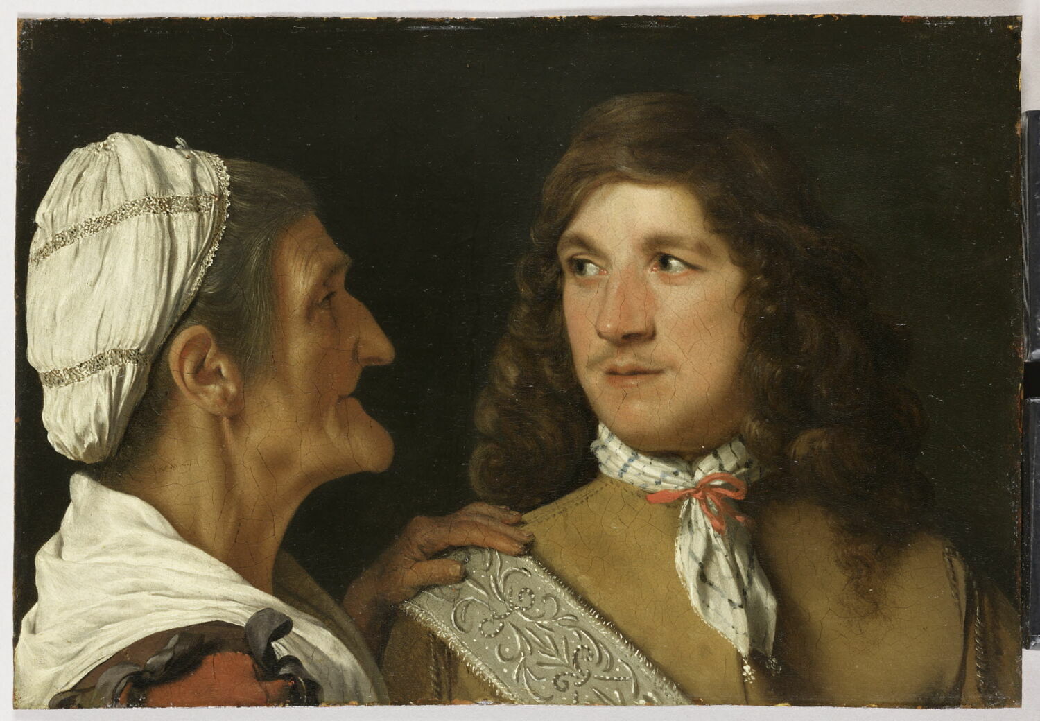 Jeune Homme et entremetteuse, Sweerts, Michael, XVIIe siècle (D’une datation discutée : encore dans la période italienne de l’artiste, vers 1652-1654 (cf. Jansen), ou, ce qui paraît préférable, au début de ses années amsterdamoises, vers 1658-1659 (cf. Kultzen), avec un raffinement qui éloigne quelque peu ce tableau de la rude période bambocciantesque de Sweerts (voir l’INV.1441)) (vers 1658 - 1659)
