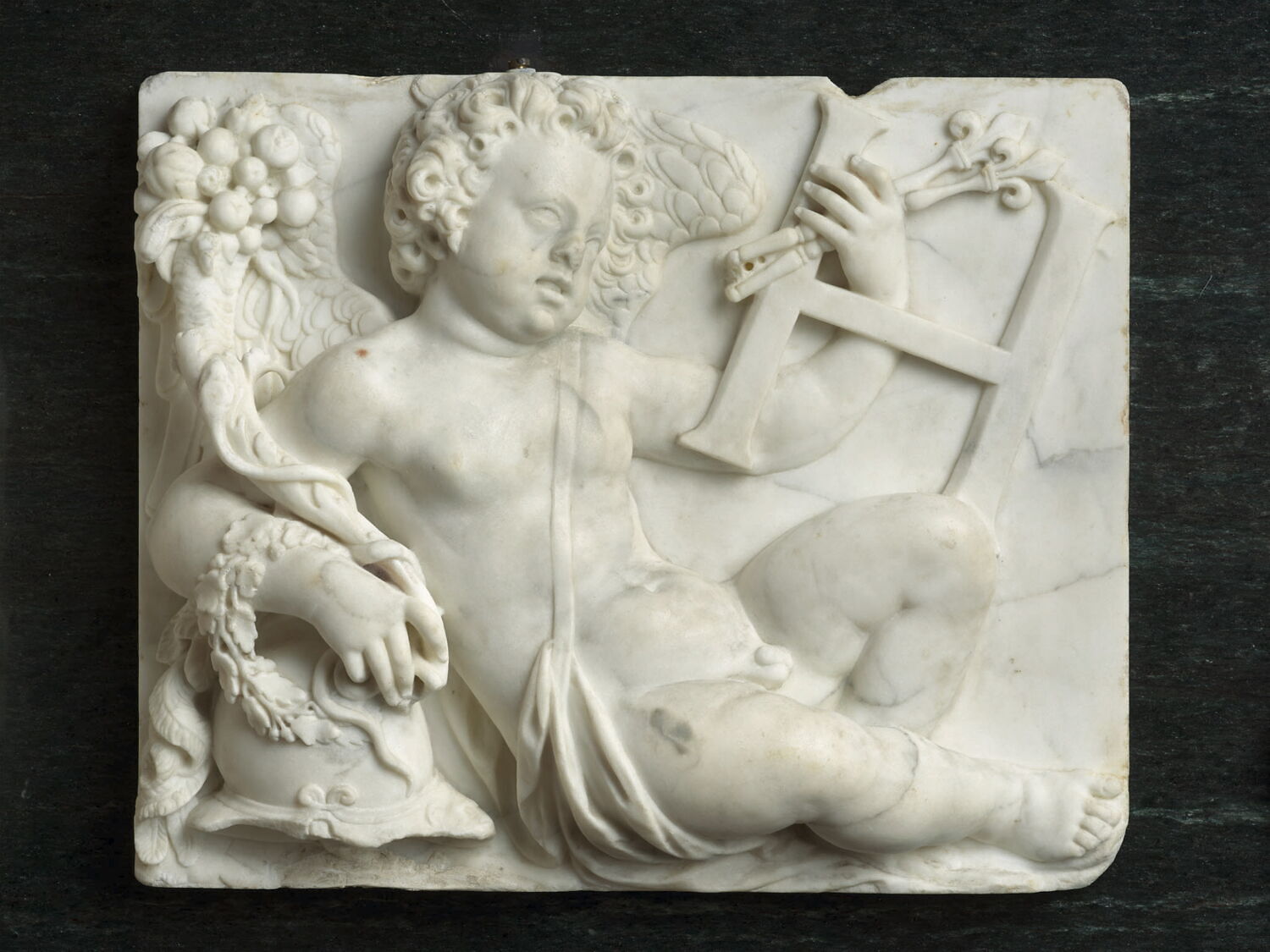 Génie appuyé sur un casque tenant une corne d'abondance, la lettre H, et les deux sceptres de France et de Navarre, buste tourné vers la droite, Jacquet, Matthieu, 1597