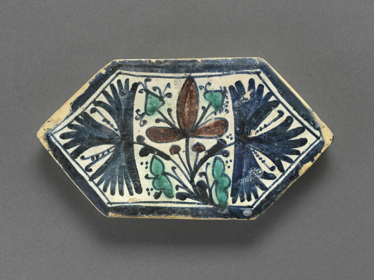 Carreau hexagonal :  feuillages tréflés