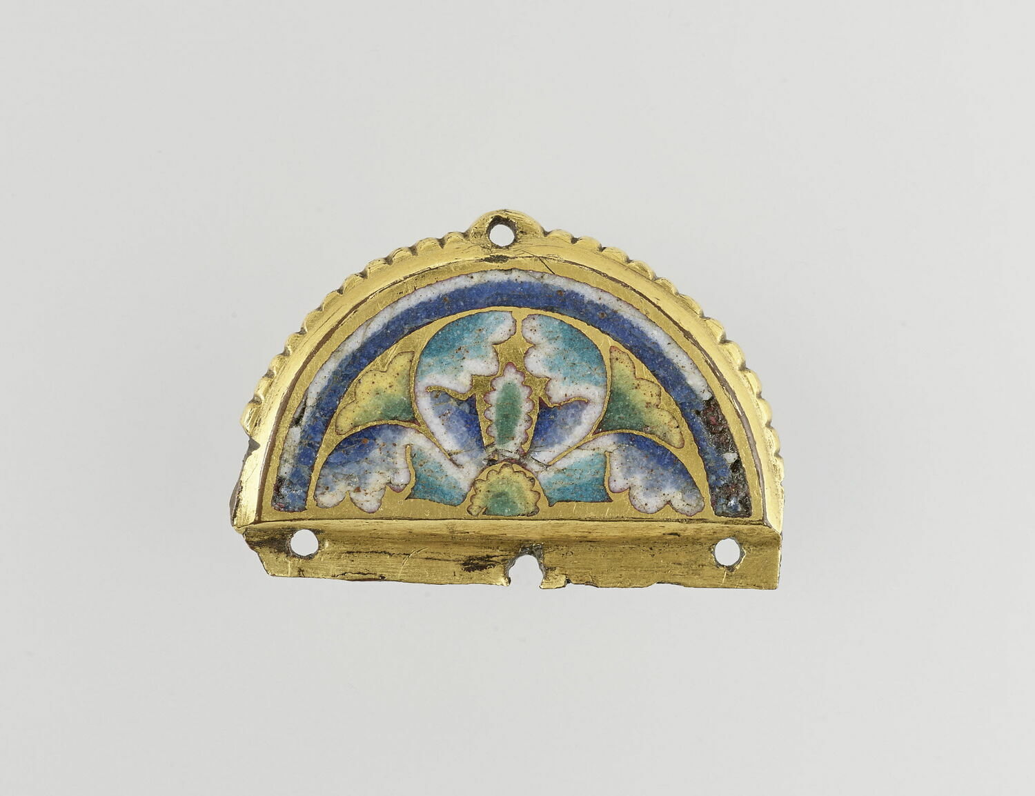 Plaquette semi-circulaire à décor de palmettes