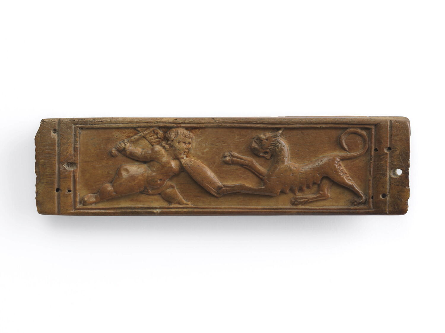 Plaque de coffret (?) : Amour luttant avec une panthère