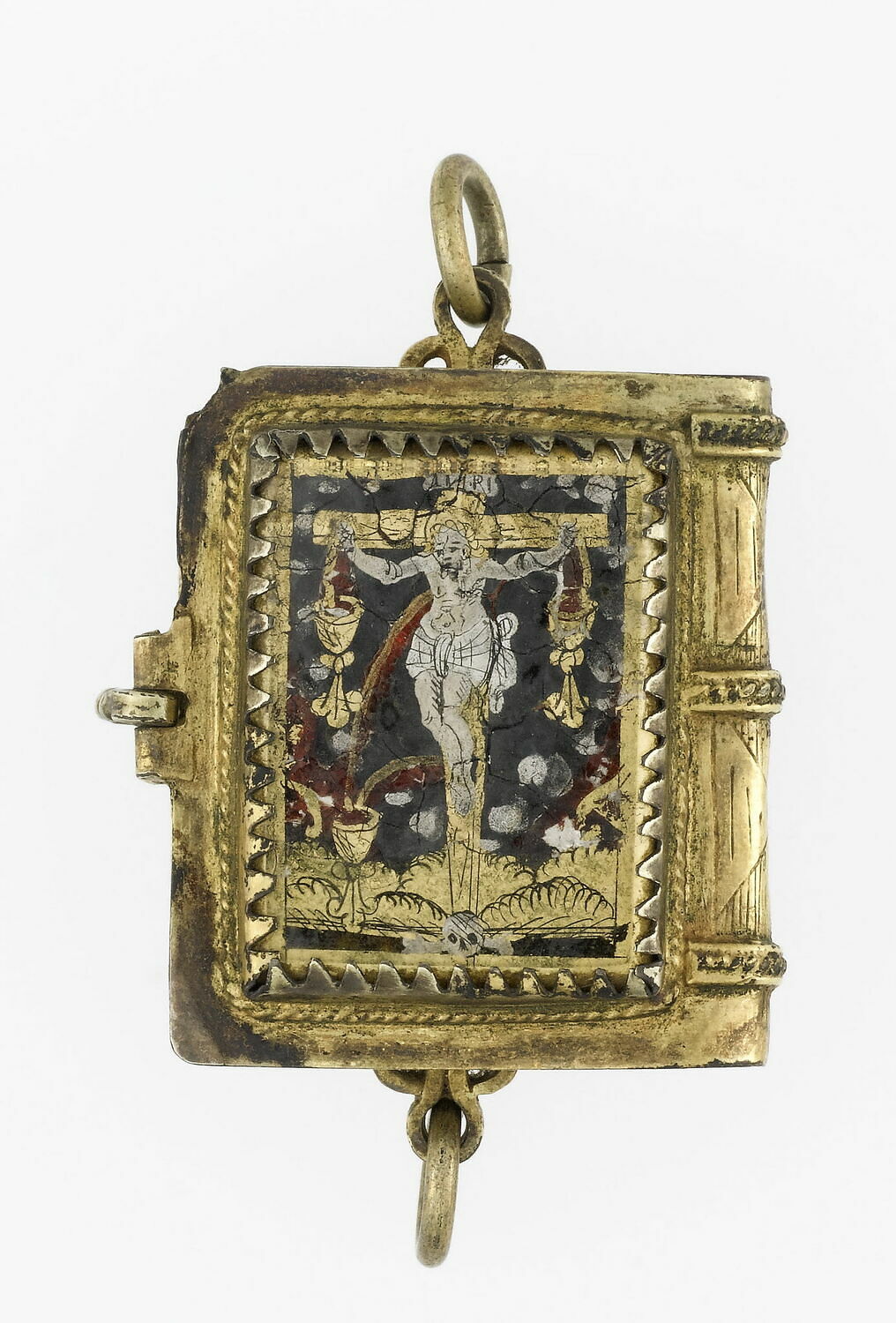 Petit livre-reliquaire en cuivre doré et ciselé ; peinture sous cristal