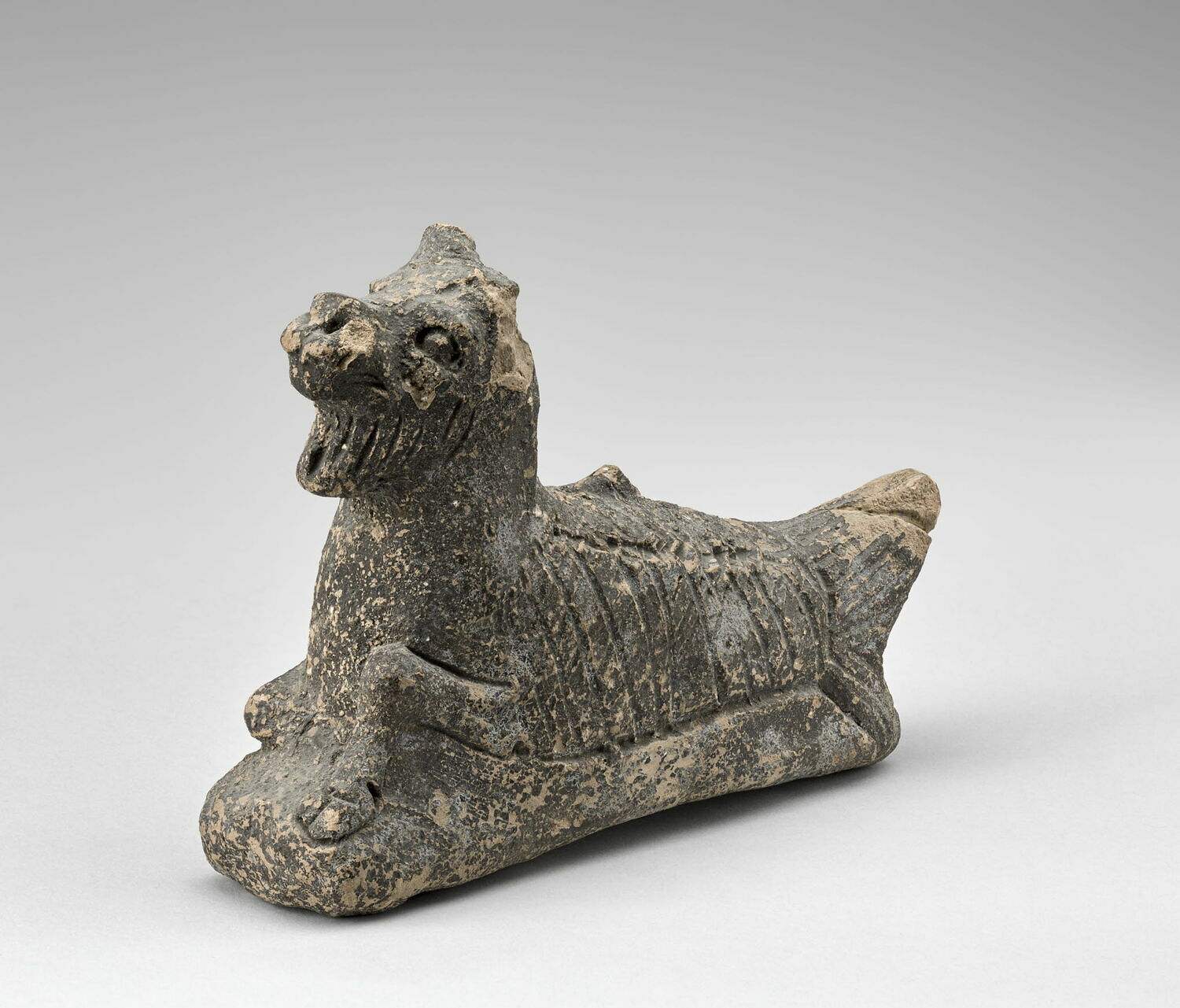 Figurine de Suhurmashu, poisson-chèvre, Néo-assyrien (1e moitié Ie mill) (-911 - -604)