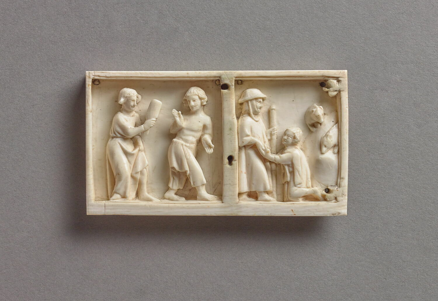 Petit panneau d'un coffret représentant des scènes de l'Histoire du fils prodigue
