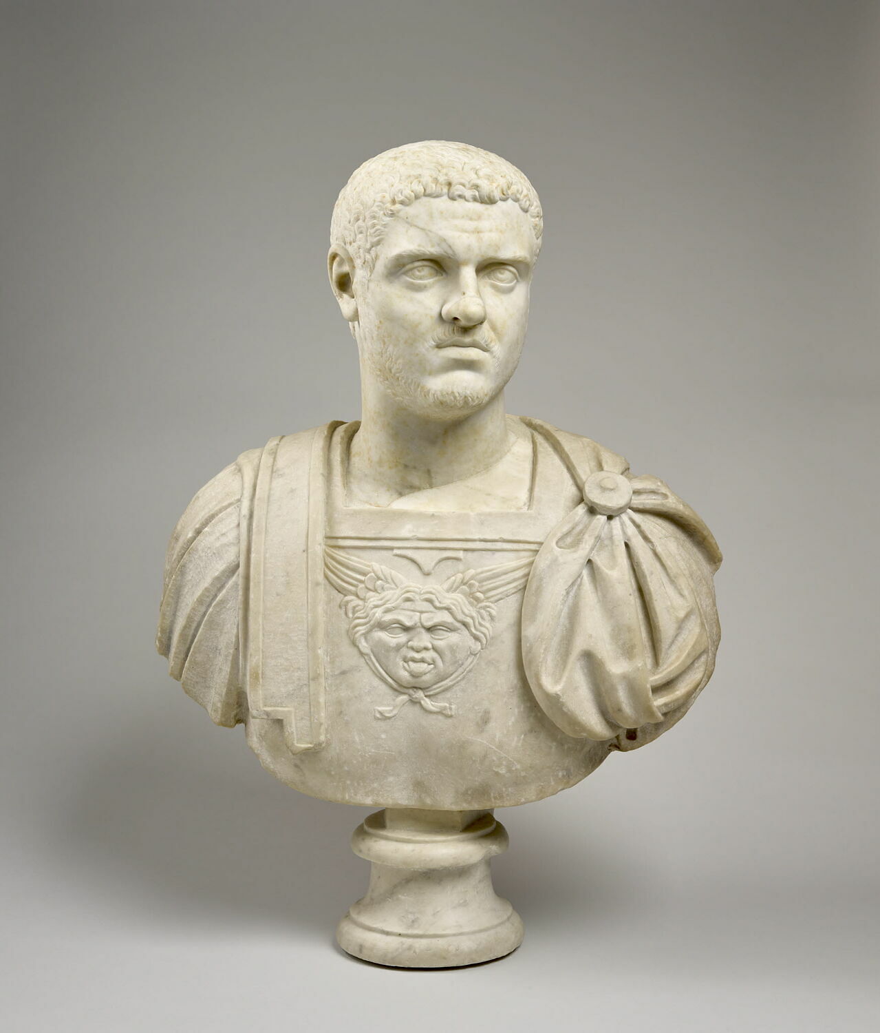 statue, romain impérial

Date de création/fabrication : 1e quart IIe s. ap. J.-C. (portrait de Géta transformé en Caracalla) (après 212)