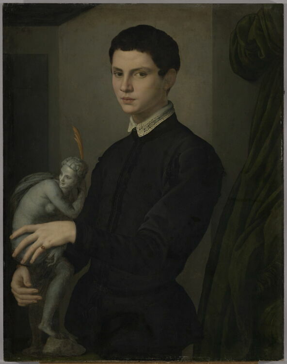 Portrait of a Man Holding a Statuette