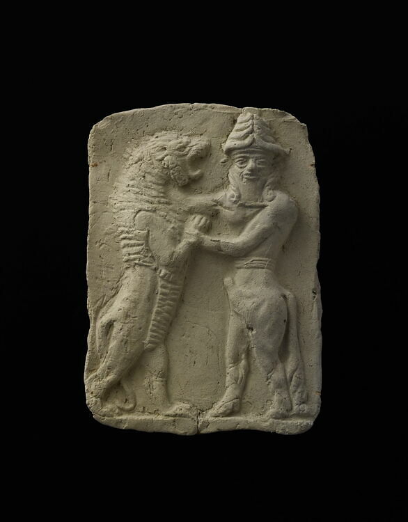 Bull-man wrestling with a lion. Terracotta relief, first half of the 2nd millennium BC.