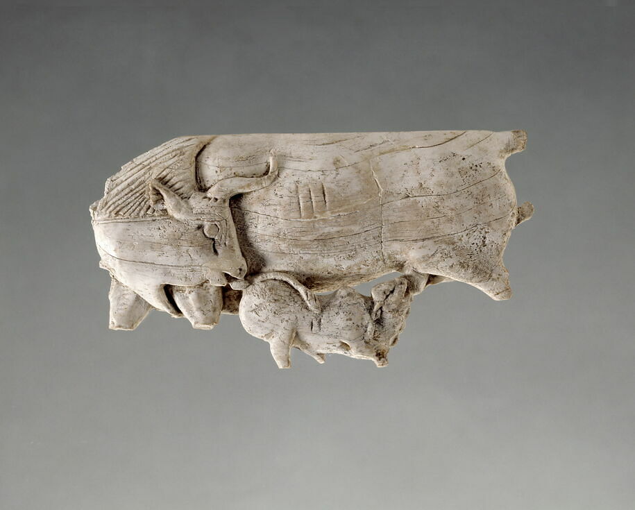 Plaque: calf feeding on its mother's milk