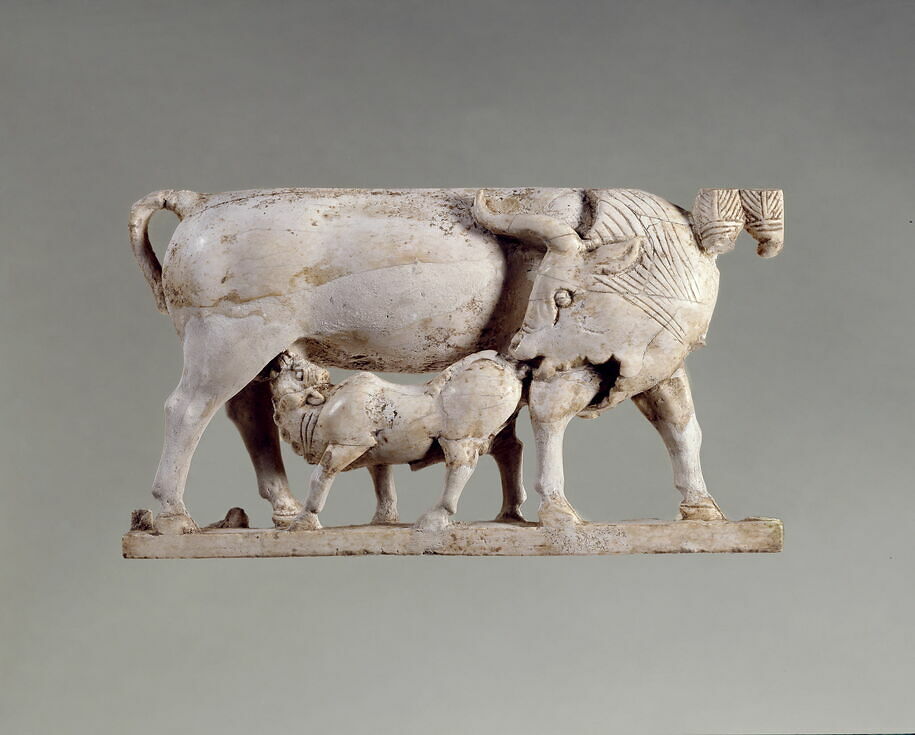 Plaque: calf feeding on its mother's milk