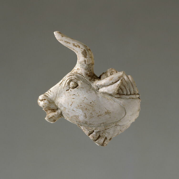 Plaque fragment: cow head