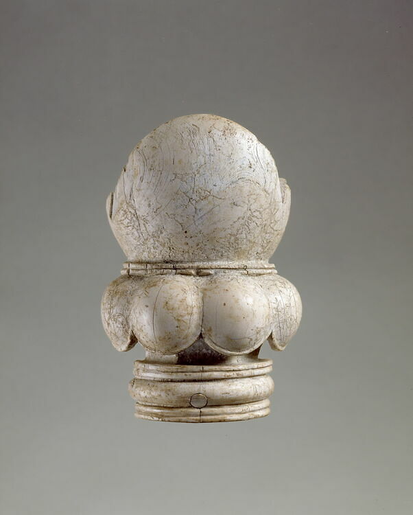 Piece of furniture decorated with a lotus flower