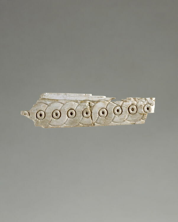 Plaque fragment: braid