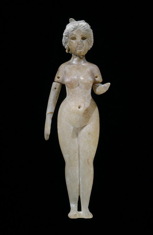 statuette of a standing naken woman, possibly the Great Goddess of Babylon