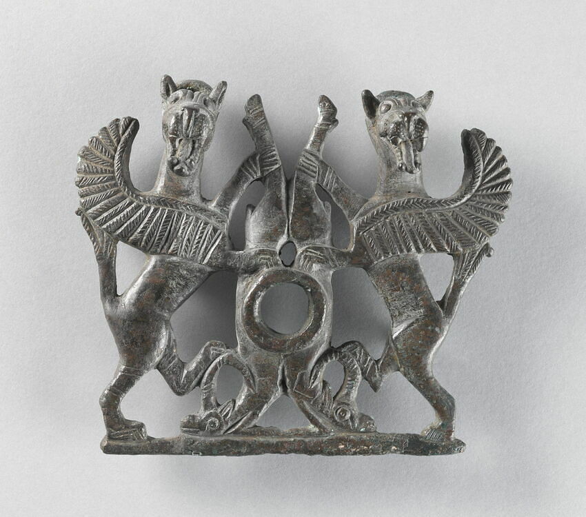Bit plaque with two winged lions seizing ibexes