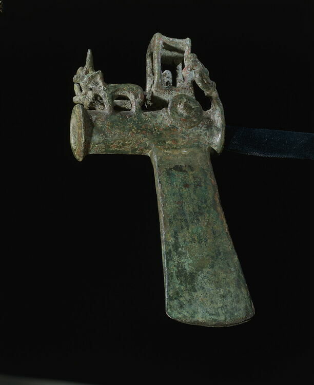 Axehead decorated with a chariot