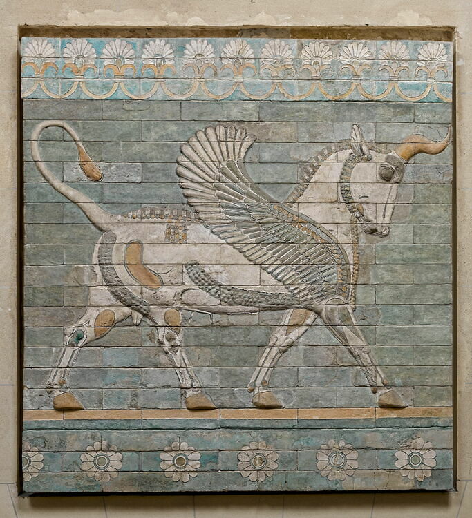 Winged bull between two floral friezes