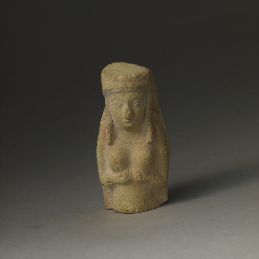 Molded statuette of a naken woman cupping her breasts