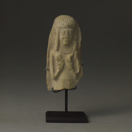 Molded statuette of a naken woman cupping her breasts