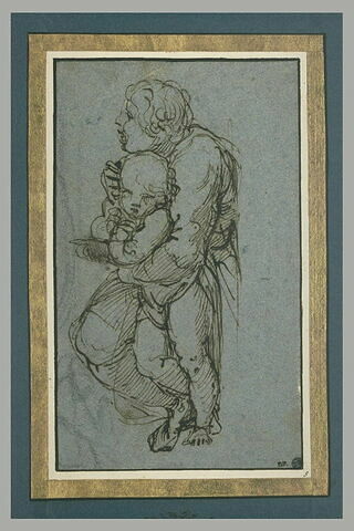 Figure agenouillée tenant un enfant, image 2/2
