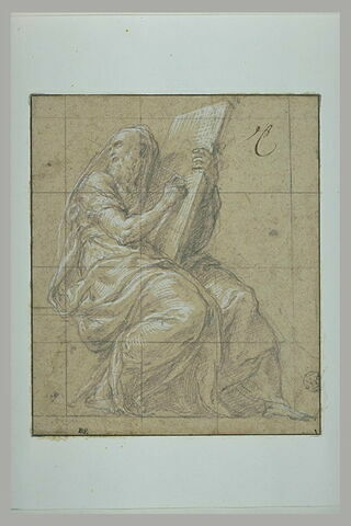 Prophète écrivant sur une grand tablette posée sur ses genoux