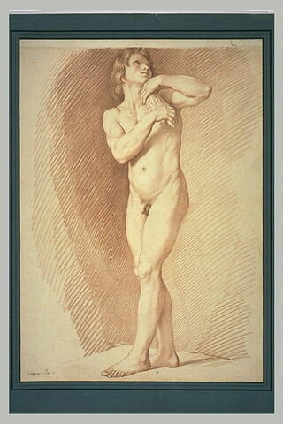 Jeune homme nu, debout, regardant vers le haut, image 2/2