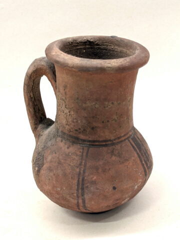 cruche ; avec contenu