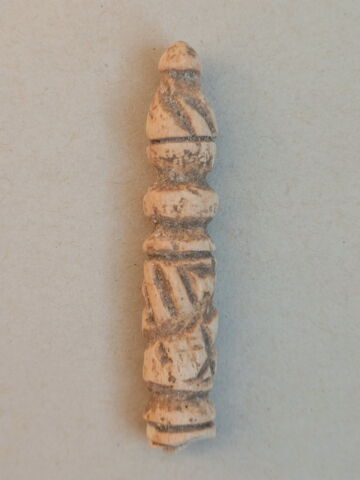 pion de jeu  ; cuiller à fard, image 1/2