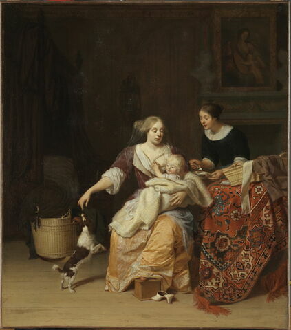 Femme nourissant un enfant
