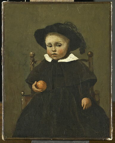 Le peintre Adolphe Desbrochers, enfant (1841-1902), tenant une orange.