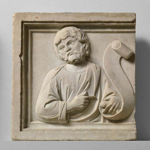 Prophète ou apôtre barbu, de face, tête inclinée vers la droite, tenant un volumen de la main gauche