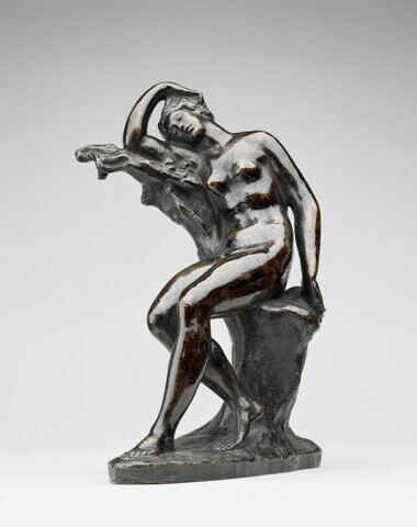 Statuette : femme nue endormie, adossée à un tronc d'arbre, image 1/3