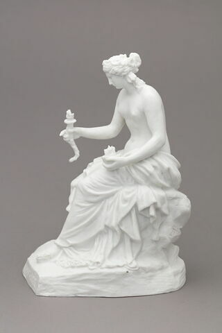 Statuette
Biscuit de porcelaine
 représentant une femme tenant un flambeau d'une main et une coupe de l'autre
Titre gravé : Message, image 1/4