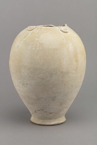 Vase piriforme en terre cuite recouverte d'un vernis transparent (manquent les anses et le col)