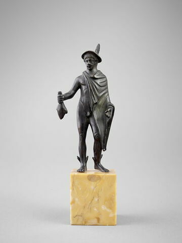 Statuette : Mercure tenant de sa main droite une bourse