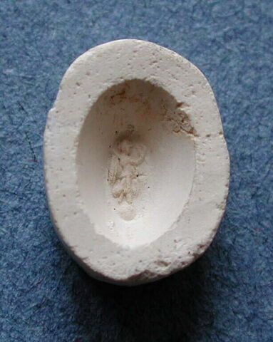 Tirage d'une empreinte d'intaille représentant Nikê sur un globe