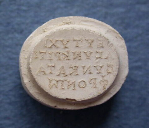 Tirage d'une empreinte d'intaille portant une inscription grecque magique, image 1/1