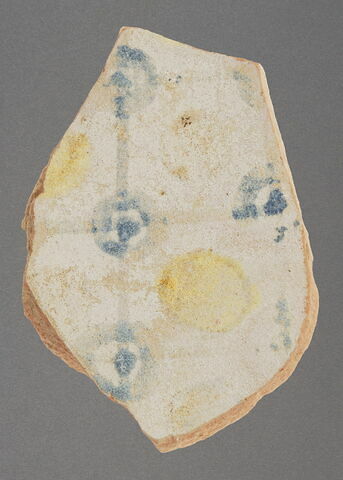 Fond de plat à décor jaune, bleu et blanc, image 1/1