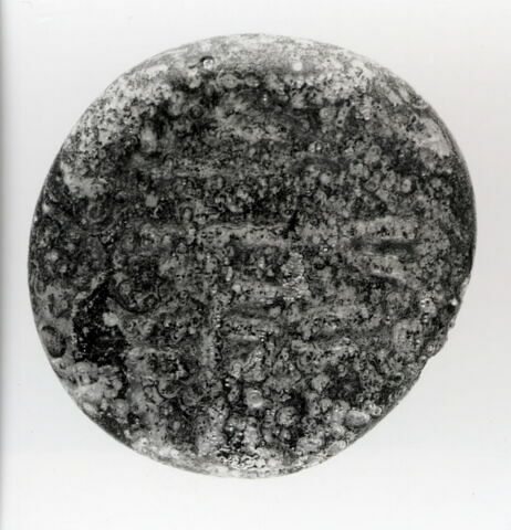 Disque à inscription illisible, image 2/2